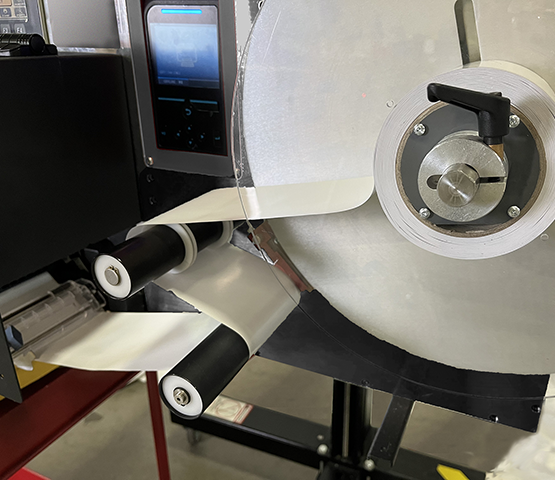 Linerless Label Print and Apply | FOX IV Technologies